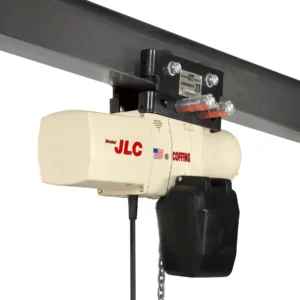 A CM Coffing Model JLC electric chain hoist is mounted on a steel I-beam trolley, with capacity label and chain bag visible.