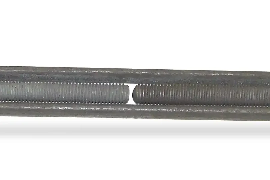 A metal turnbuckle with a clevis end on the left and an eye end on the right, used for adjusting tension in cables or ropes.